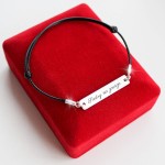 Srebrna Bransoletka z Podłużną Blaszką na Sznurku Grawer