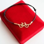 Złota Bransoletka Rower na Sznurku
